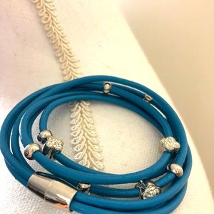 It could be necklace or bracelet, blue with silver and crystals